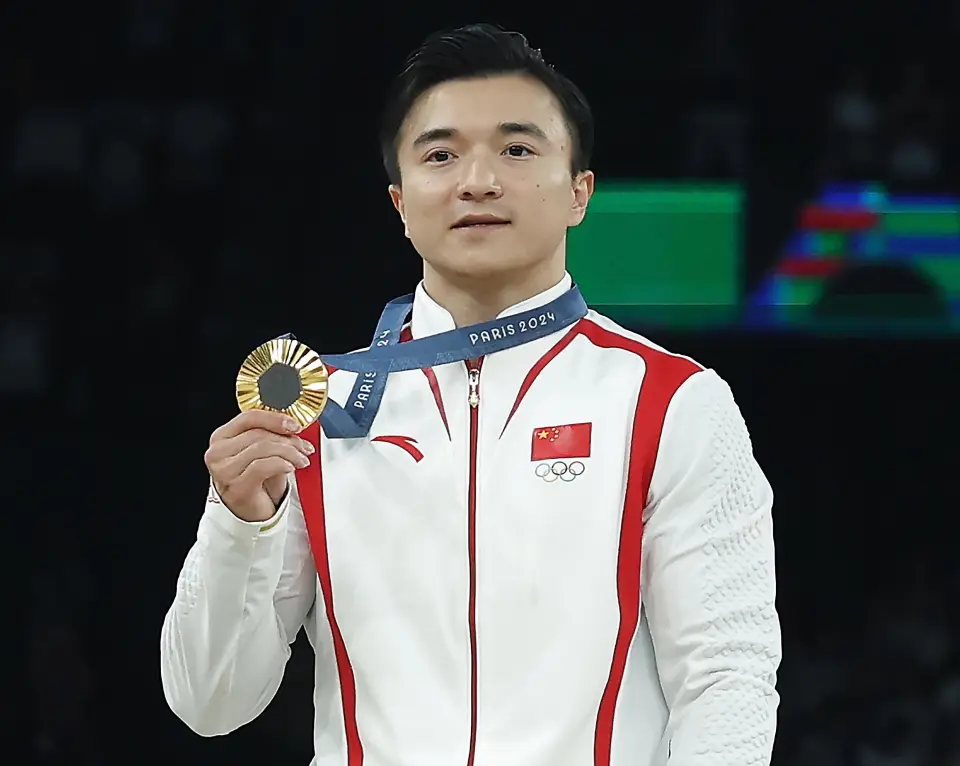中国女举重冠军雯雯是哪里人_女子举重冠军李雯雯_举重雯雯体重